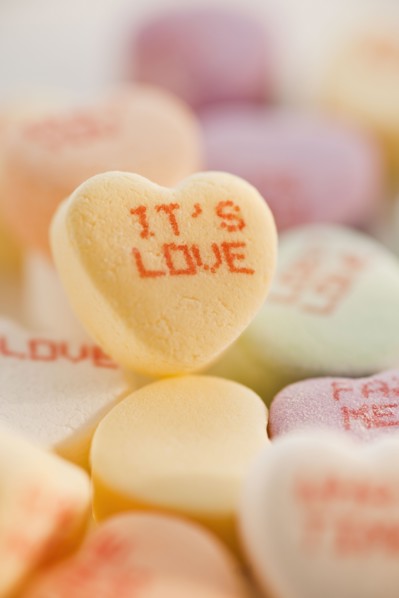Close up of candy hearts.