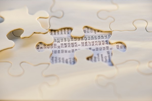 Puzzle pieces and stock numbers.