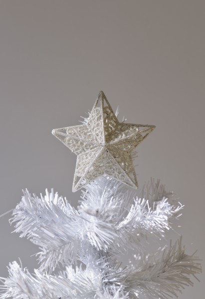 Star on artificial Christmas tree.
