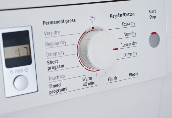 Close up of Dial on Washing Machine.