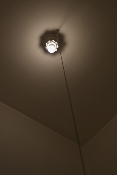 A lightbulb in a room.