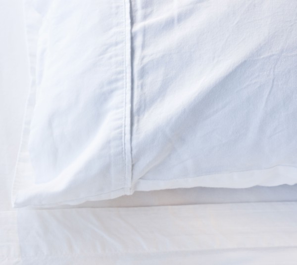 A pillow in a bed