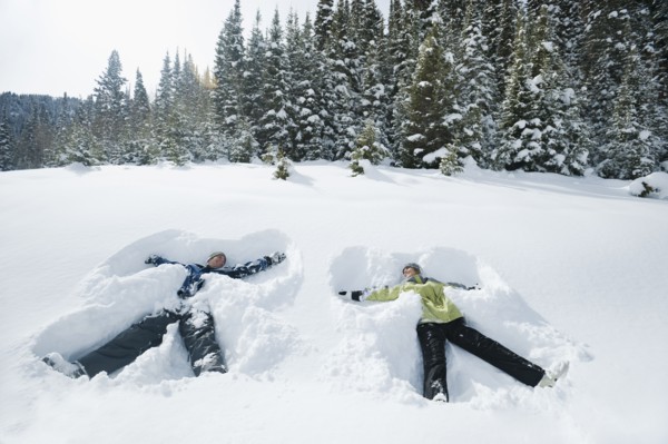 A couple outdoors in the snow