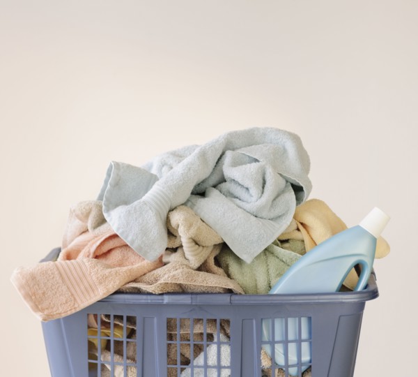 A laundry basket full of towels.