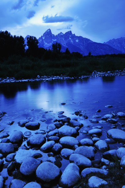 Scenic view of lake and mountains.