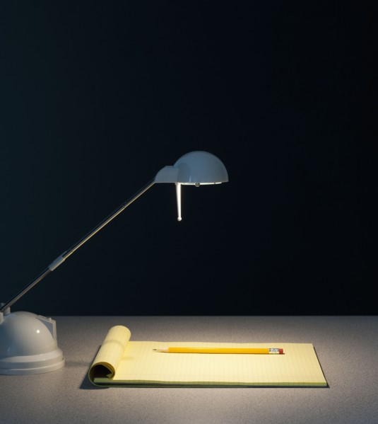 Light and pad of paper.