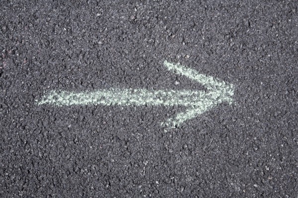 Arrow pointing right on pavement