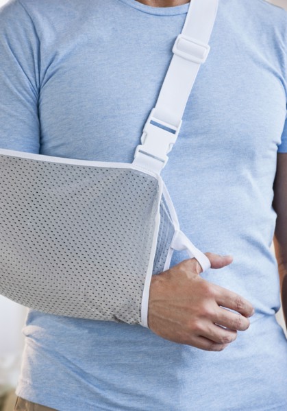 Man with arm in sling.