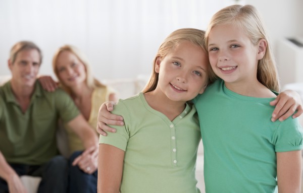 Happy sisters at home.