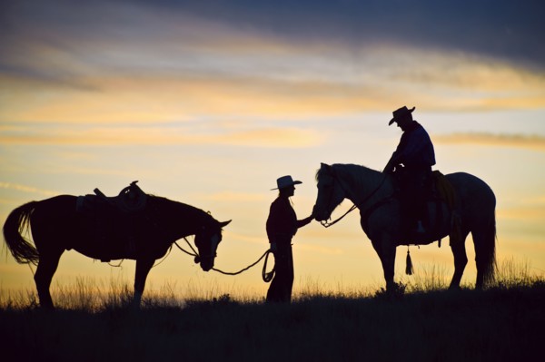 Horseback riders.