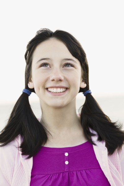 Young girl with ponytails