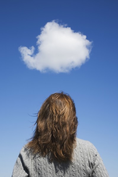 Woman looking at cloud