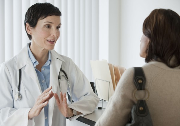 Doctor talking to patient.