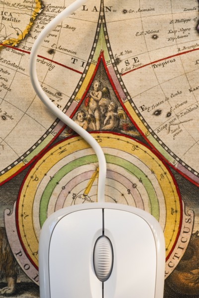 Maps and computer mouse.