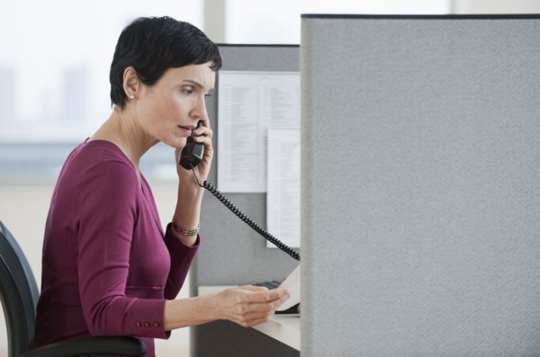 Woman talking on phone.
