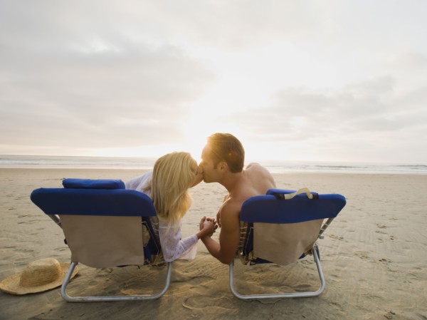 Couple kissing at the beach