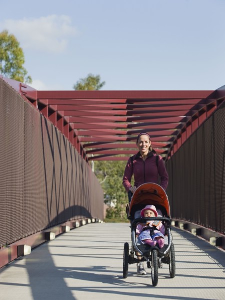 Woman pushing stroller