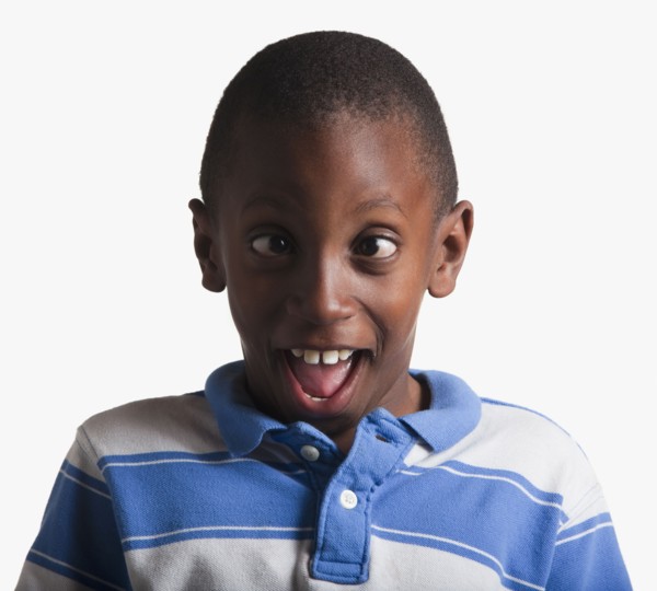 Portrait of boy making silly face