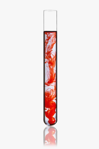 Red mixture in beaker