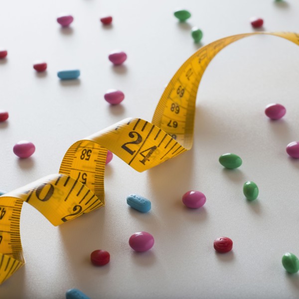Measuring tape and diet pills