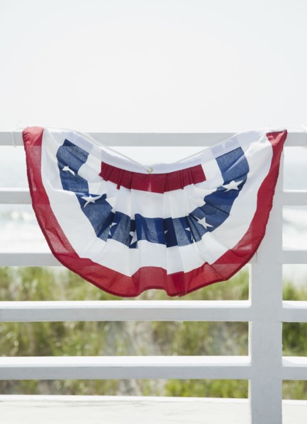 American flag decoration on fence