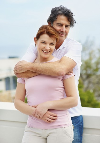Man embracing woman. Photographer: momentimages