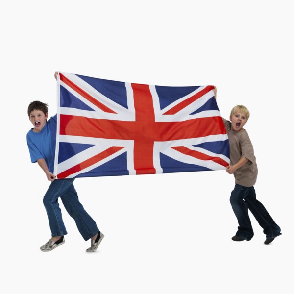 Children carrying flag. Photographer: momentimages