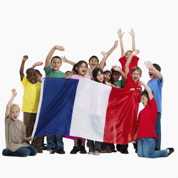 Children holding flag. Photographer: momentimages