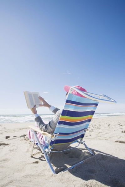 Reading at the beach. Photographer: Chris Hackett