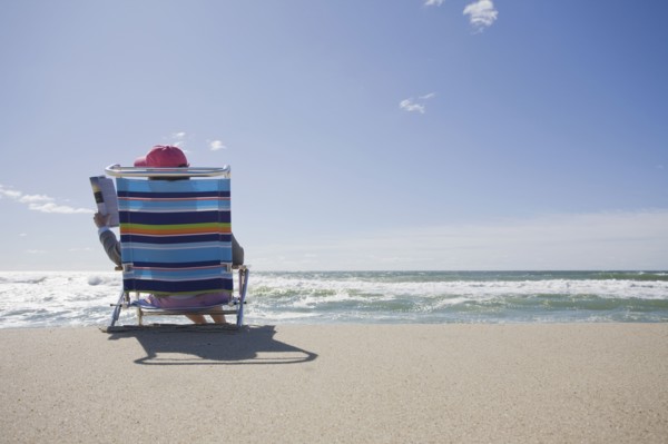 Reading at the beach. Photographer: Chris Hackett