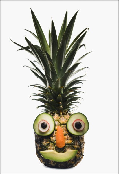 Pineapple with a happy face. Photographer: Mike Kemp