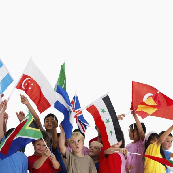 Children waving flags. Photographer: momentimages