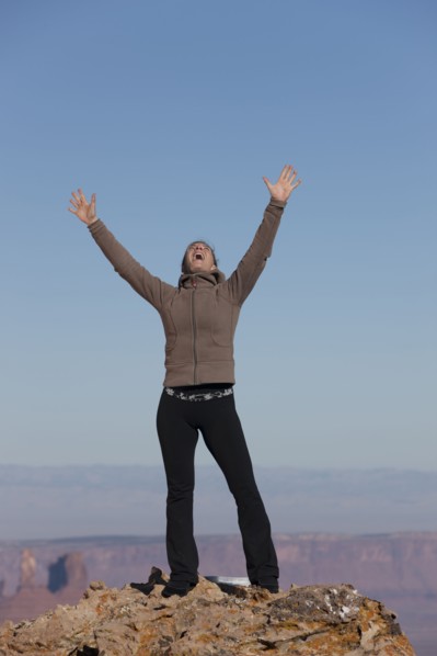 Woman at top of canyon. Photographer: Dan Bannister