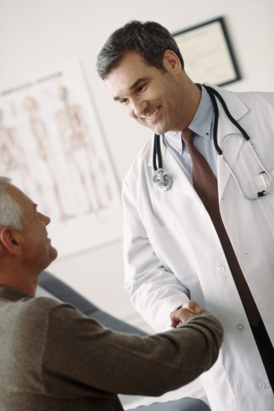 Doctor talking to patient. Photographer: Rob Lewine