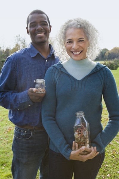 Couple holding jars. Photographer: Pauline St.Denis