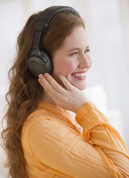 Woman wearing headphones.