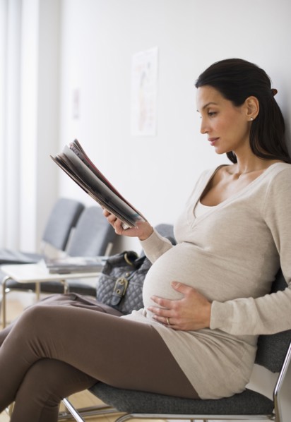 Pregnant woman in waiting room.