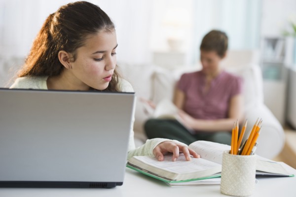 Young girl doing homework.