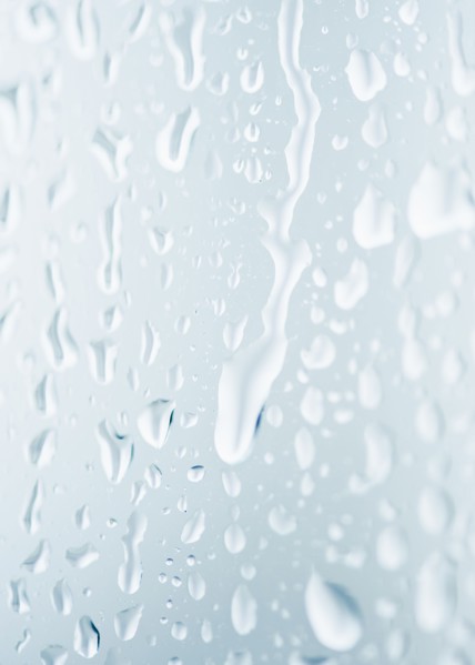 Drops of rain on window. Photographe : Jamie Grill