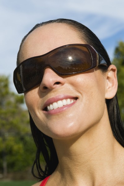 Woman wearing sunglasses.
