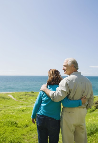 Couple looking at the ocean.