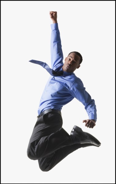 Businessman jumping. Photographe : Mike Kemp