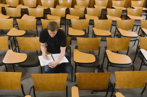 Last student left in college lecture hall.