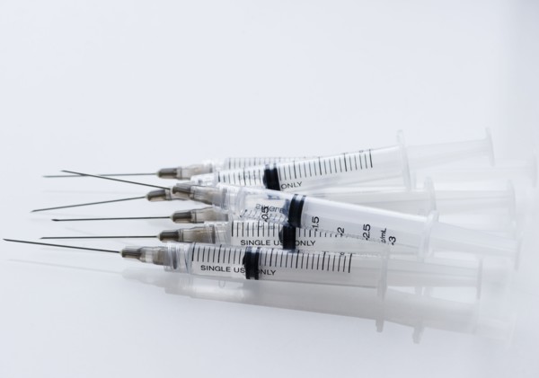 Pile of syringes. Photo : Jamie Grill