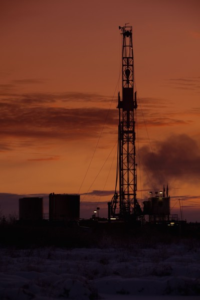 Oil drilling rig at dusk. Photo : Dan Bannister
