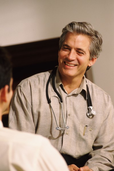 Doctor consulting with patient. Photo : Rob Lewine