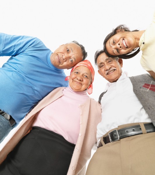 Four friends standing together. Photo : momentimages