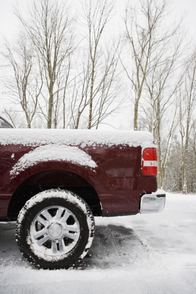 Rear of pickup truck covered in snow. Photo : Chris Hackett