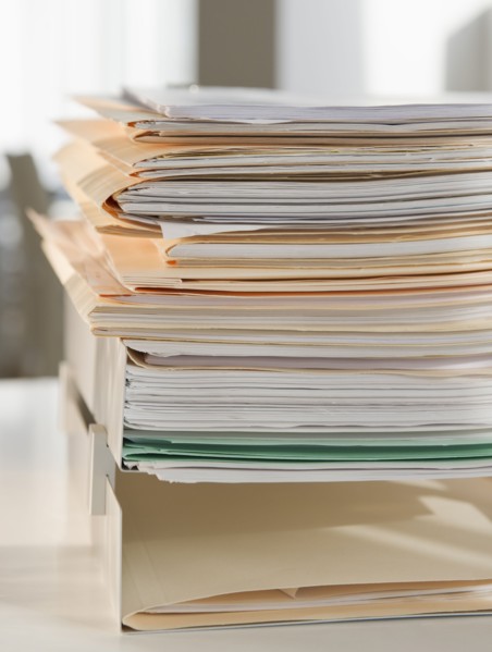 Stack of paperwork. Photo : Jamie Grill