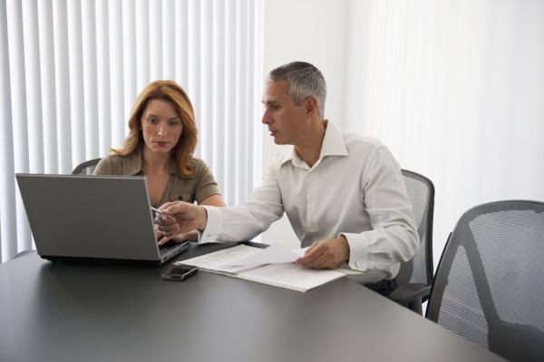 Business people in conference room.